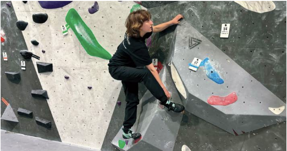 Scaling heights: Students participate in rock climbing